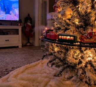 Emerald Express on a snowy white Christmas tree